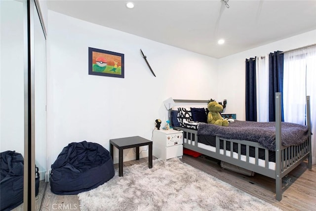 bedroom featuring light hardwood / wood-style flooring