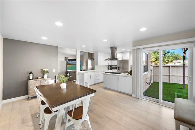 dining room featuring light hardwood / wood-style flooring