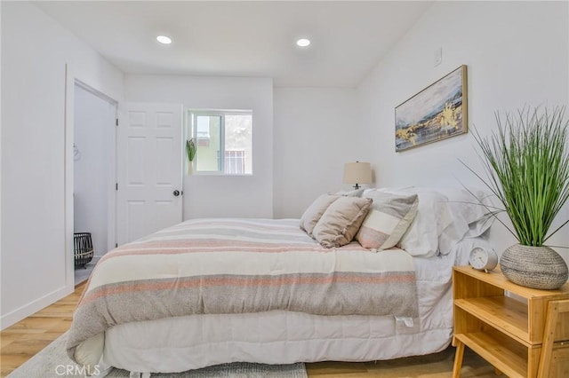 bedroom featuring wood-type flooring