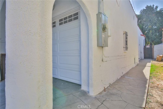 view of property exterior with a garage