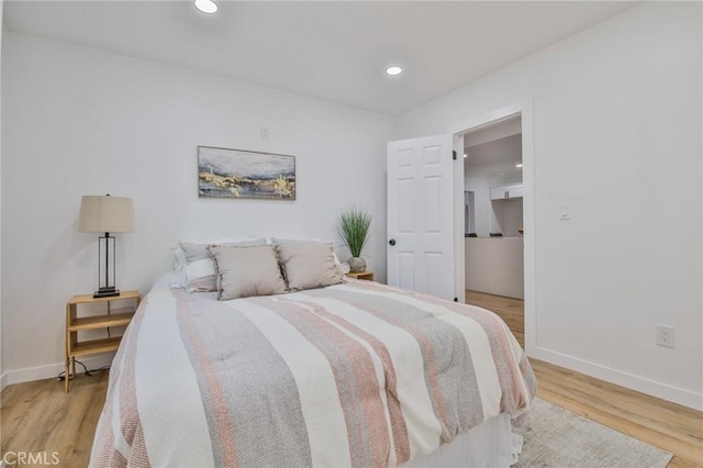 bedroom featuring light hardwood / wood-style flooring