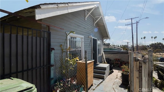 view of property exterior with washer / dryer