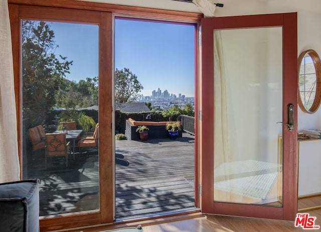 doorway to outside featuring hardwood / wood-style flooring