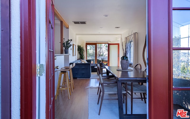 dining room with hardwood / wood-style floors