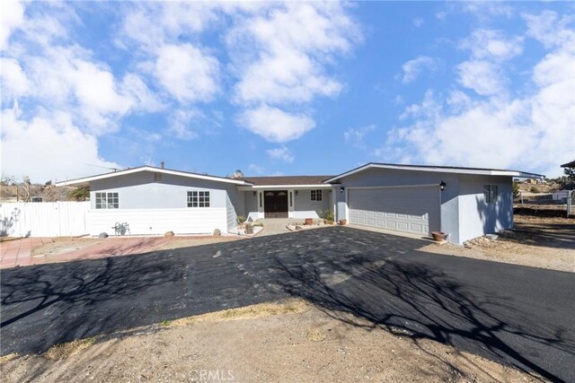 ranch-style house with a garage