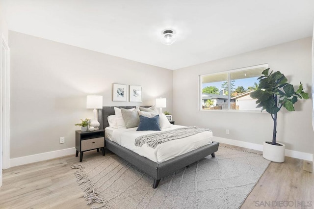 bedroom featuring light wood-type flooring