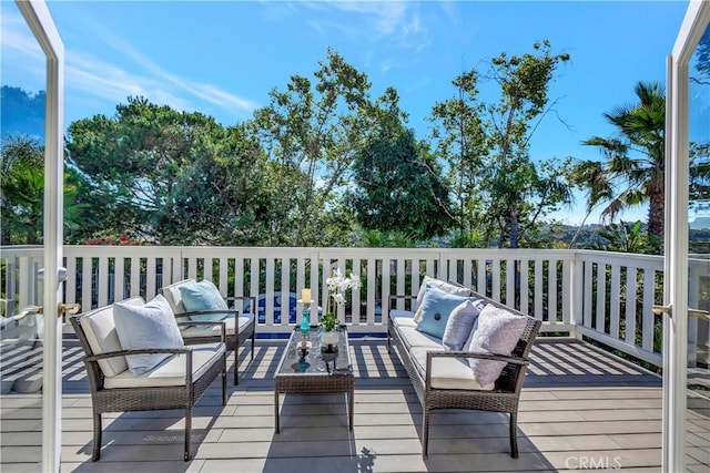 deck with an outdoor living space