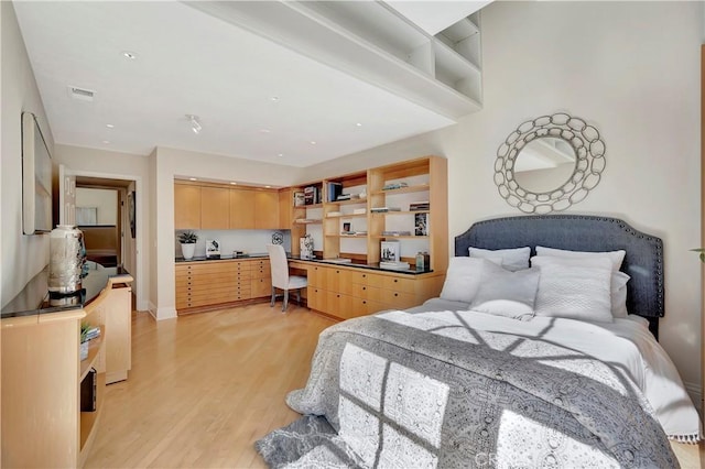 bedroom featuring light hardwood / wood-style floors