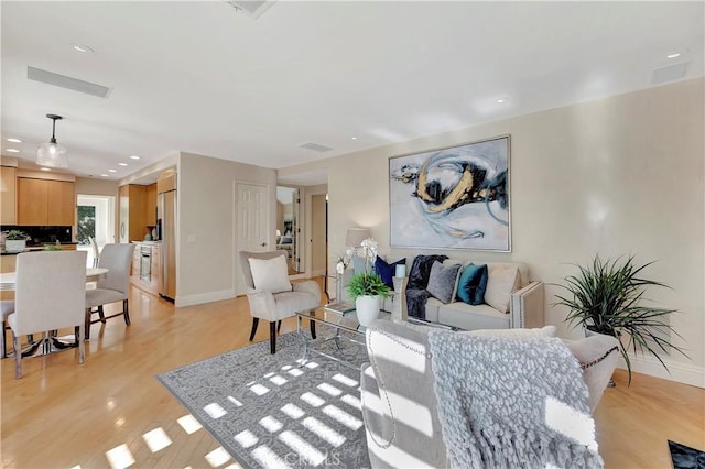 living room featuring light hardwood / wood-style floors