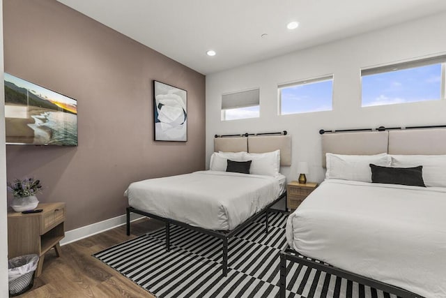 bedroom featuring dark hardwood / wood-style floors