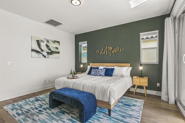 bedroom featuring hardwood / wood-style flooring