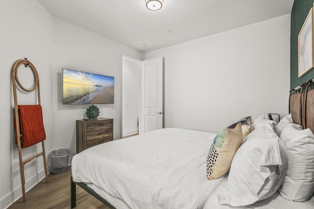 bedroom featuring hardwood / wood-style flooring