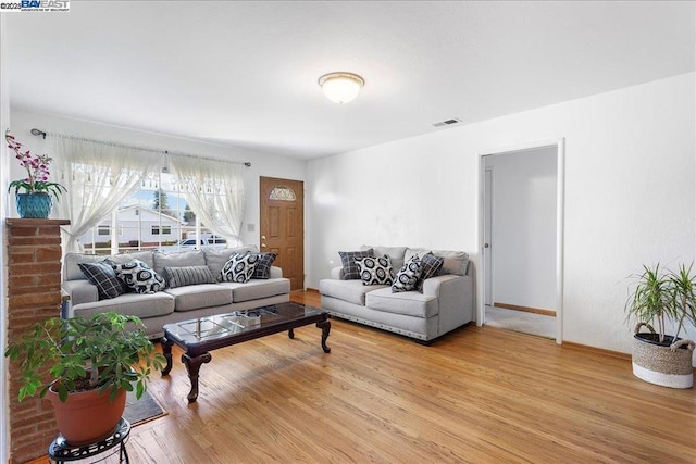 living room with light wood-type flooring