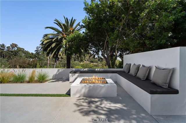 view of patio featuring a fire pit