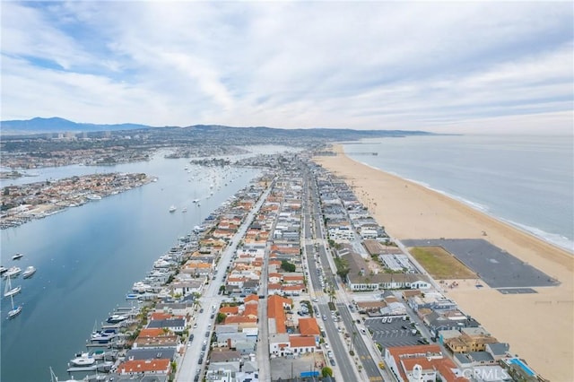 bird's eye view with a water and mountain view