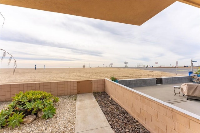 exterior space with a patio area and fence