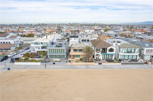 drone / aerial view with a residential view and a mountain view