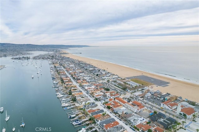 aerial view with a beach view and a water view