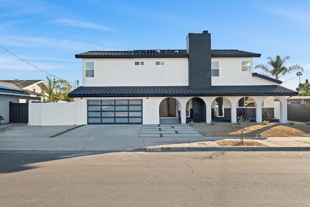 view of front of property with a garage