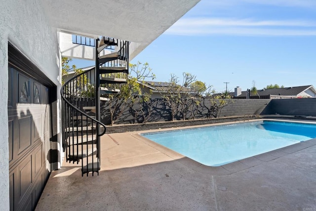 view of pool with a patio area