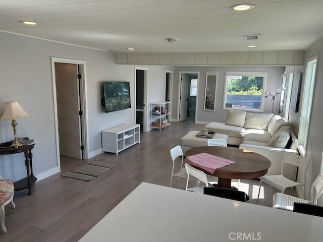 living room featuring dark hardwood / wood-style flooring