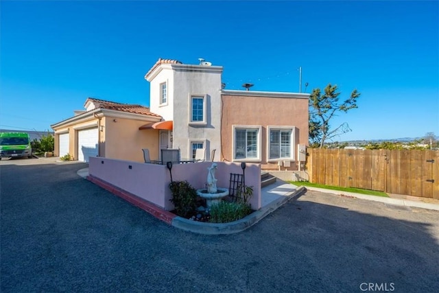 view of front of house with a garage