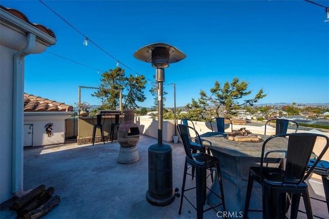 view of patio / terrace featuring an outdoor bar