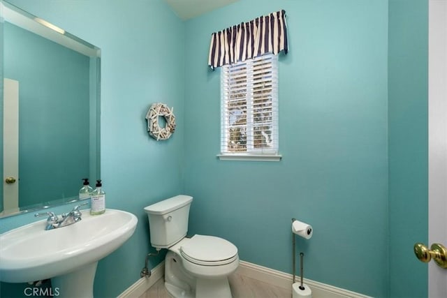 bathroom with sink and toilet