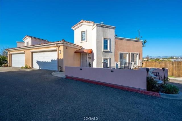 view of front of home featuring a garage