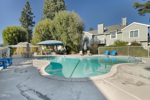 view of pool with a gazebo and a patio area