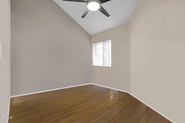 unfurnished room with lofted ceiling, ceiling fan, and dark hardwood / wood-style floors