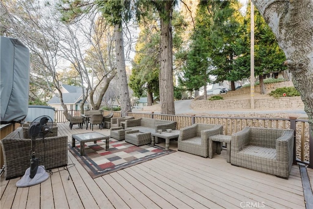 deck featuring an outdoor living space