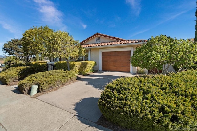 view of front of home with a garage