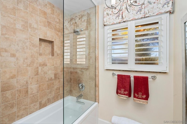 bathroom featuring enclosed tub / shower combo