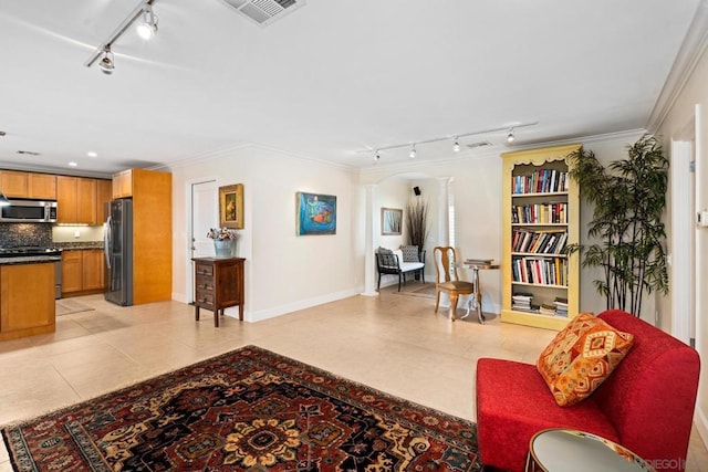 tiled living room featuring ornamental molding