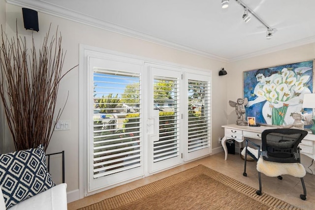 tiled home office featuring track lighting and crown molding