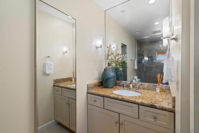 bathroom with vanity and walk in shower