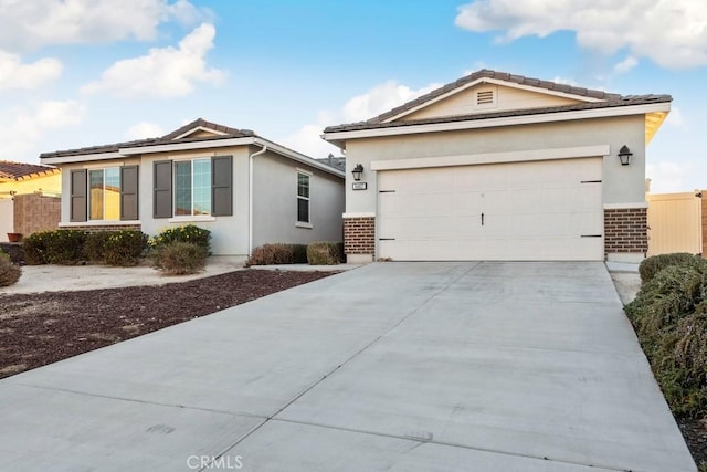 single story home with a garage