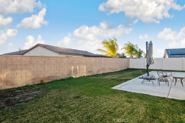 view of yard with a patio area