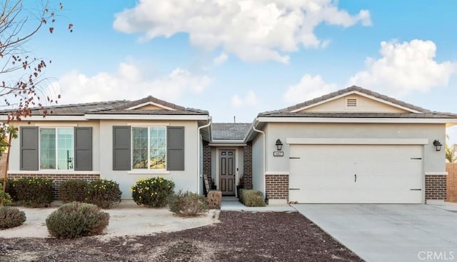 single story home featuring a garage