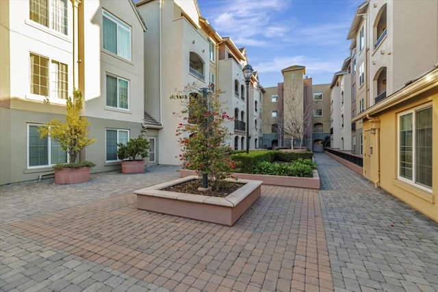 view of property's community with a patio