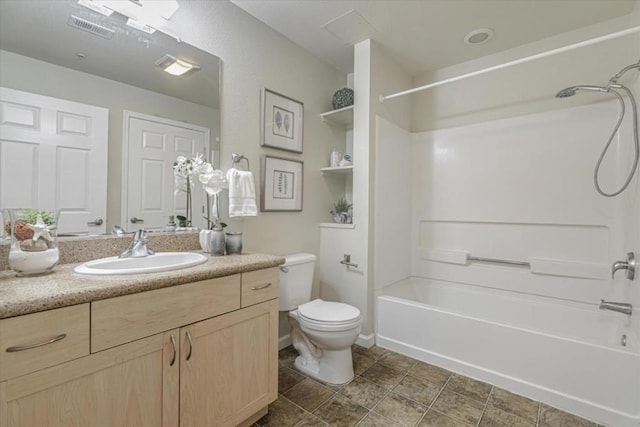 full bathroom featuring shower / bathing tub combination, vanity, and toilet