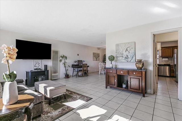 living room with light tile patterned floors