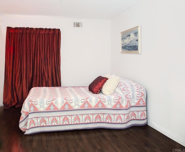 bedroom featuring hardwood / wood-style floors