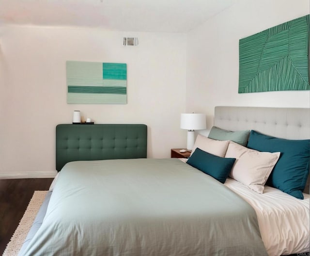 bedroom featuring wood-type flooring