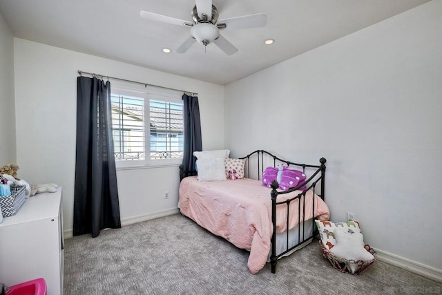 carpeted bedroom featuring ceiling fan