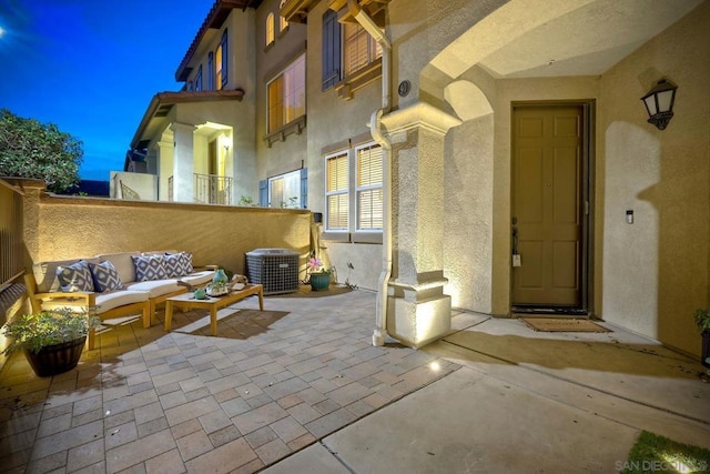 view of patio featuring central air condition unit and outdoor lounge area