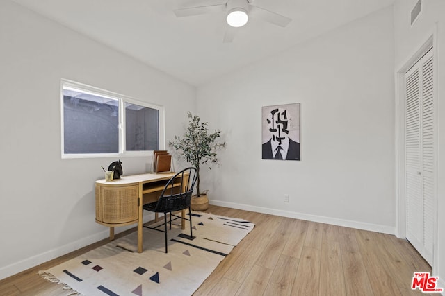 office featuring ceiling fan and light hardwood / wood-style floors