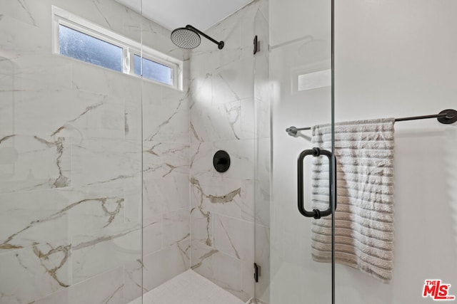 bathroom with walk in shower