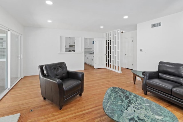 living area with light wood-type flooring